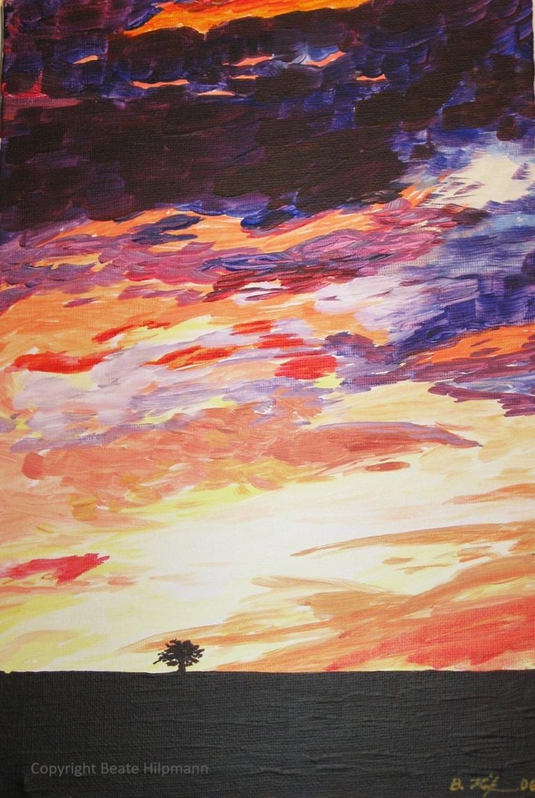 ein sehr bewegter Himmel - von der tief stehenden Sonne in viele Farben getaucht.